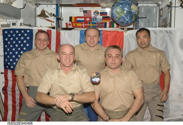 NASA image: Expedition 22 Crewmembers pose for photo in the Node 2 during Expedition 22