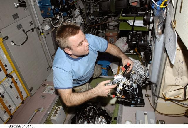 NASA image: Suraev with Earth Observation Experiment in the SM during Expedition 22
