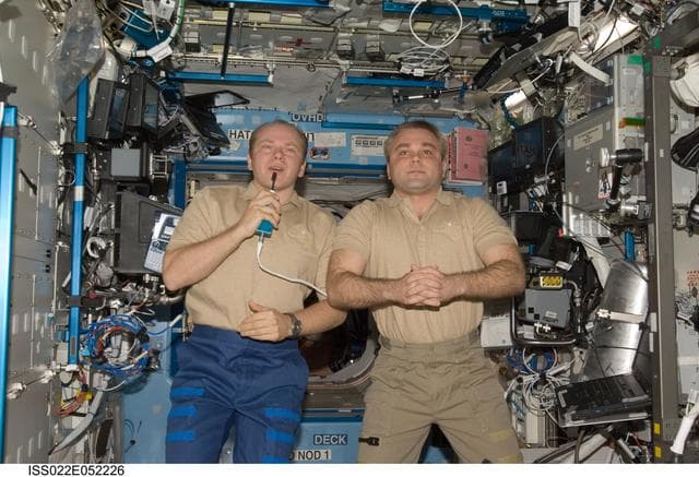 NASA image: Kotov and Suraev during Tagup with Specialists in the U.S. Laboratory during Expedition 22