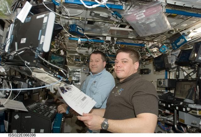 NASA image: Patrick and Beneken in the U.S. Laboratory during Joint Operations