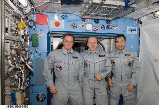 NASA image: Creamer, Kotov, and Noguchi pose for photo in the JPM during Expedition 22
