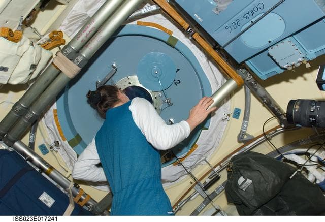 NASA image: Dyson in MRM2 following Soyuz TMA-18/22S Hatch Opening