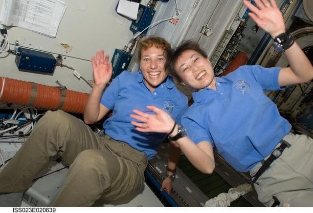 NASA image: Metcalf-Lindenburger and Yamazaki in Node 2 following Hatch Opening