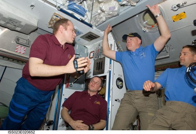NASA image: Crewmembers in Node 2 following Hatch Opening