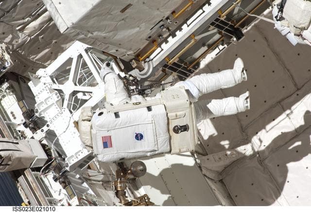 NASA image: Anderson in Discovery Payload Bay during EVA 1
