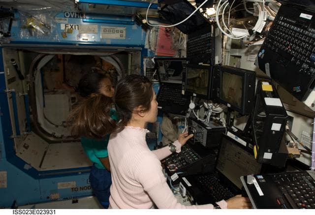 NASA image: Yamazaki and Wilson in US Lab during MPLM Transfer
