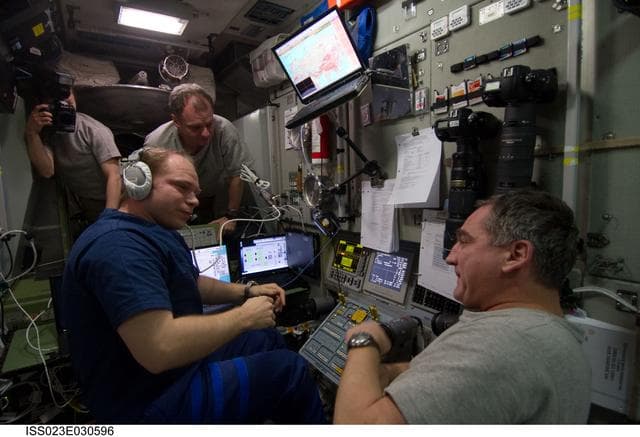 NASA image: Crewmembers in SM during Progress 37P Docking