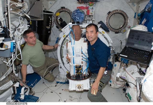 NASA image: Skvortsov and Noguchi with Matroshka-2 Kibo Hardware