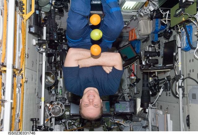 NASA image: Kotov with Fresh Fruit in the SM