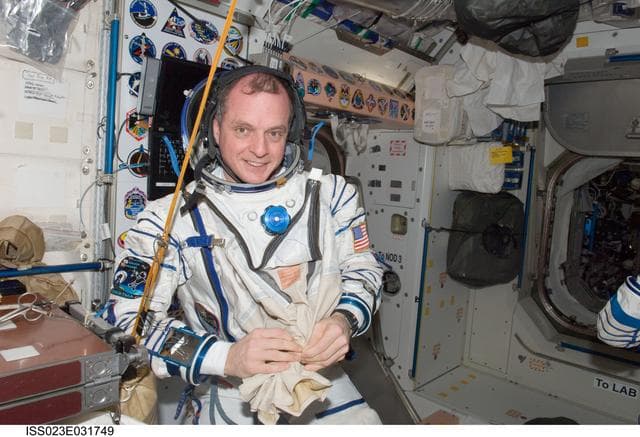 NASA image: Creamer prepares for Sokol Suit Leak Check