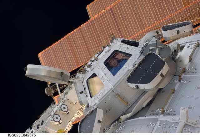 NASA image: View of Noguchi in a Cupola Window