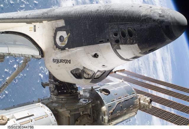 NASA image: View of the FWD ISS and docked Atlantis during EVA 1