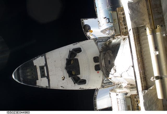 NASA image: View of the Docked Atlantis and FWD ISS during EVA 1