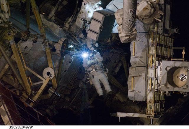 NASA image: Good and Reisman during EVA 3