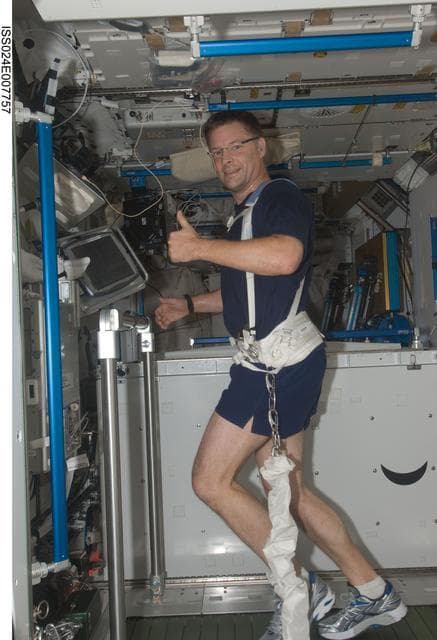NASA image: FE Wheelock exercises on the T2 Treadmill in the Node 3