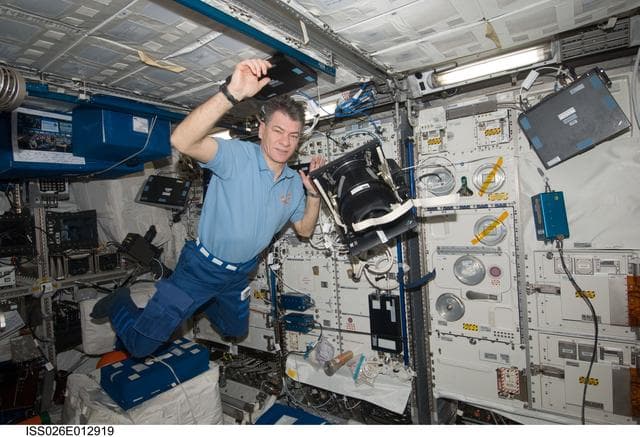 NASA image: Nespolia moving the Neurospat Hardware in the Columbus Module during Expedition 26