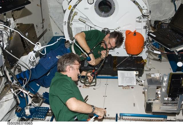 NASA image: Nespoli and Kaleri during emergency scenario drill