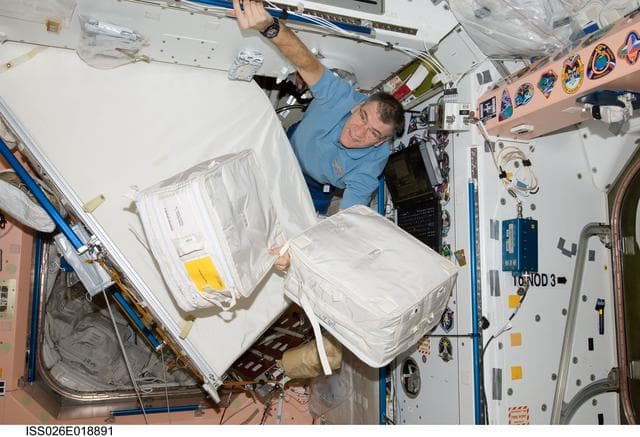 NASA image: Nespoli moves cargo in the Node 1