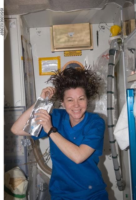 NASA image: Coleman washes her hair