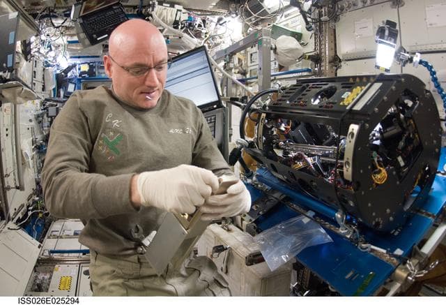 NASA image: Kelly makes hardware replacements on MDCA