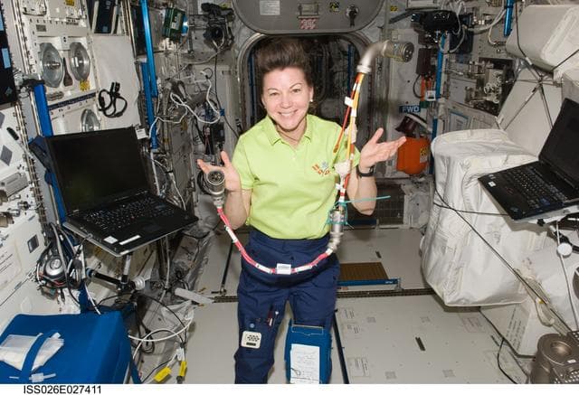 NASA image: Coleman holds W6005 Power Jumper in the Columbus Module