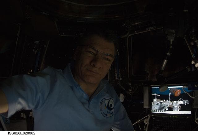 NASA image: Nespoli in the Cupola Module during Japanese Kounotori HTV-2 Transfer Vehicle Relocation