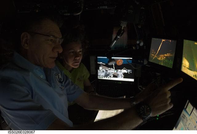 NASA image: Coleman and Nespoli in the Cupola Module during Japanese Kounotori HTV-2 Transfer Vehicle Relocation