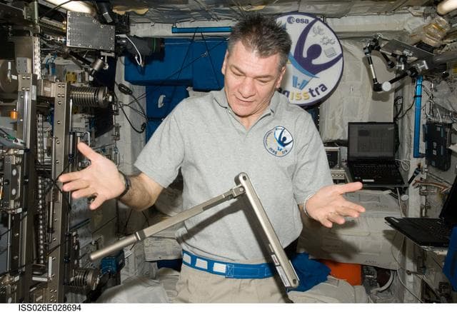 NASA image: Nespoli watches Can Crusher Tool