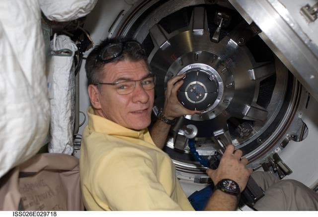 NASA image: Nespoli removes docking mechanism to the ATV Hatch