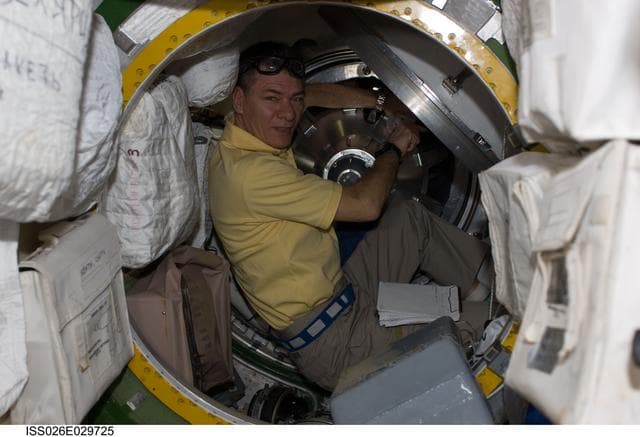 NASA image: Nespoli removes docking mechanism to the ATV Hatch
