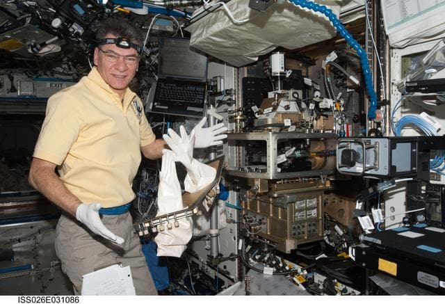 NASA image: Nespoli works with the LMM Spindle Bracket Assembly in the FIR