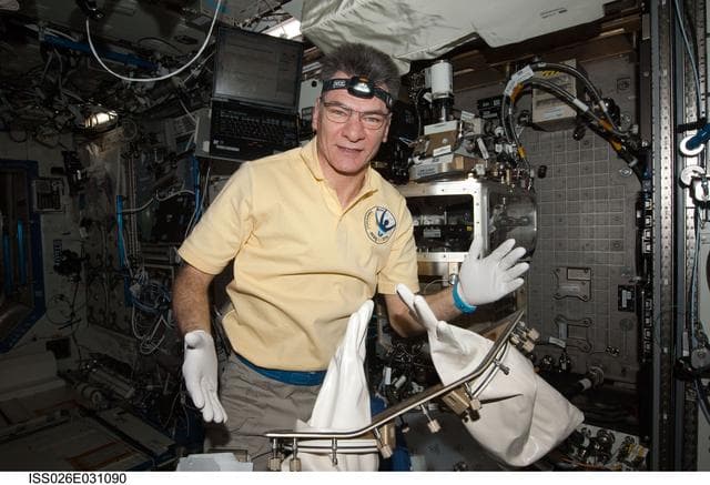 NASA image: Nespoli works with the LMM Spindle Bracket Assembly in the FIR