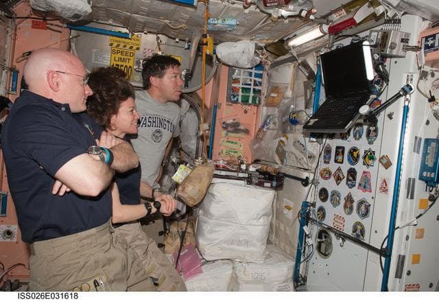 NASA image: Expedition 26 and STS-133 Crewmembers watching monitor