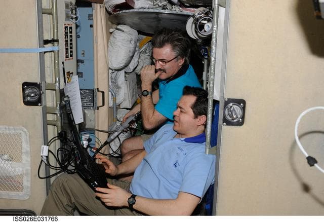 NASA image: Skripochka and Kaleri watch monitor