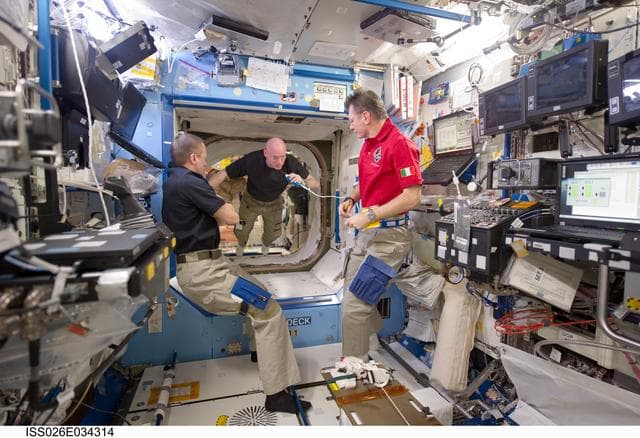 NASA image: Expedition 26 Crewmembers during Daily Conference
