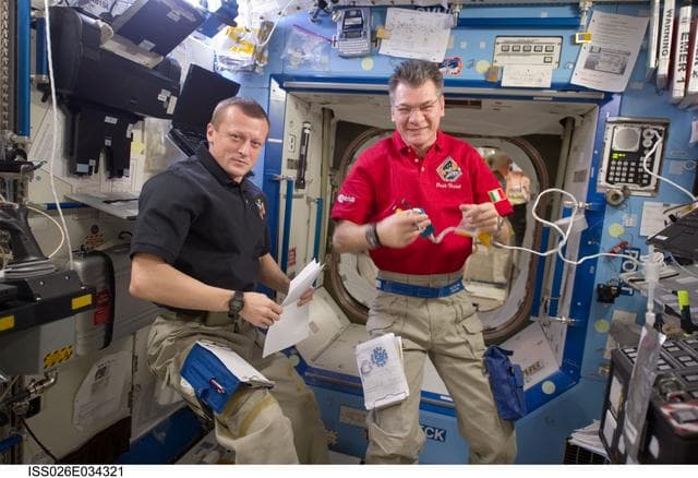 NASA image: Expedition 26 Crewmembers during Daily Conference
