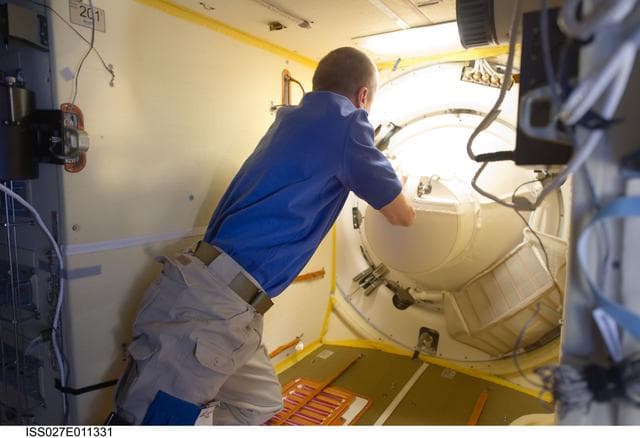 NASA image: Soyuz TMA-21/26S Hatch Opening