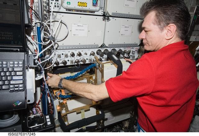 NASA image: Nespoli installs ALTEA-SHIELD Hardware in the US Laboratory