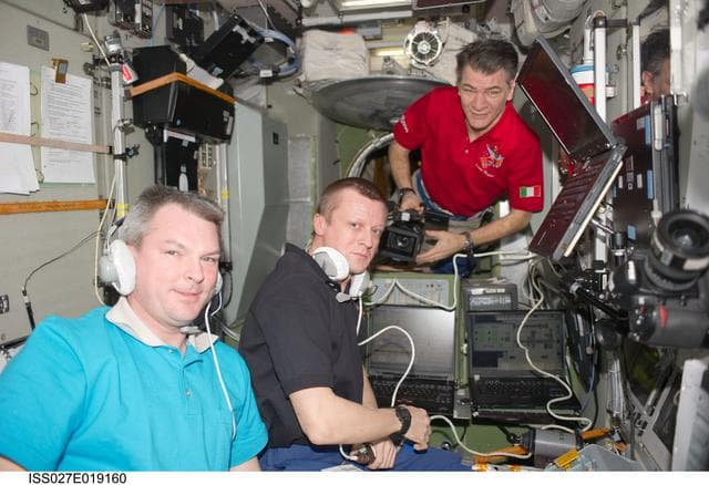 NASA image: Samokutyaev, Kondratyev and Nespoli in the SM during Progress 42P Docking