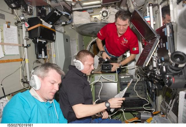 NASA image: Samokutyaev, Kondratyev and Nespoli in the SM during Progress 42P Docking