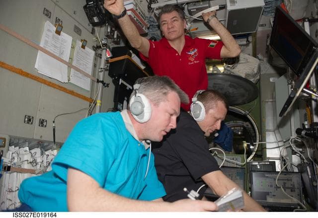 NASA image: Samokutyaev, Kondratyev and Nespoli in the SM during Progress 42P Docking
