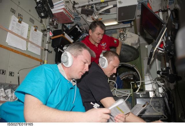 NASA image: Samokutyaev, Kondratyev and Nespoli in the SM during Progress 42P Docking