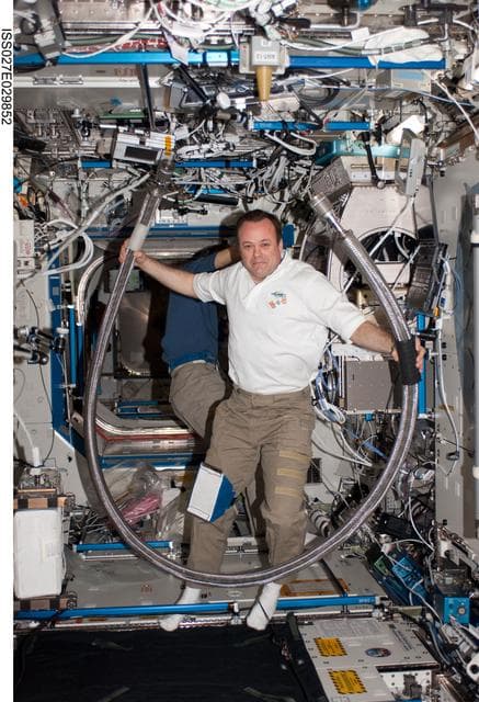 NASA image: Garan poses with MCA VAJ in the US Lab