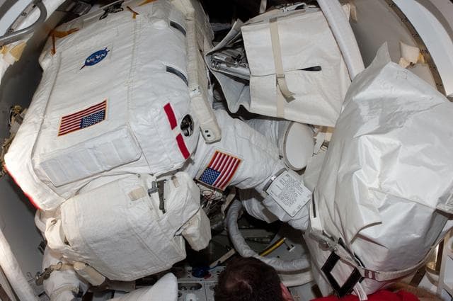 NASA image: Crewmembers in Crew Lock prior to EVA 1