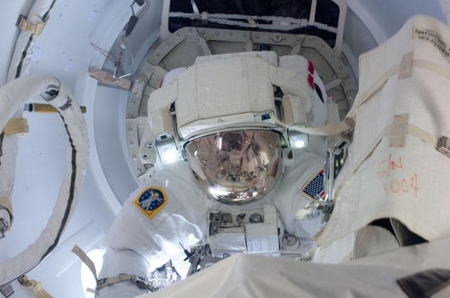 NASA image: Chamitoff egresses Crew Lock at the start of EVA 1