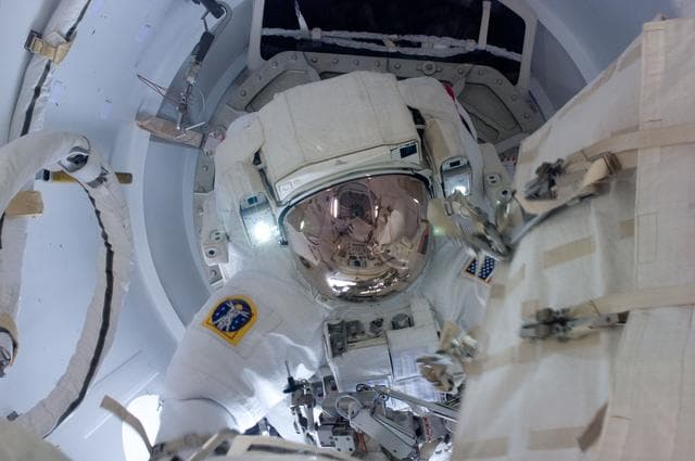 NASA image: Chamitoff egresses Crew Lock at the start of EVA 1