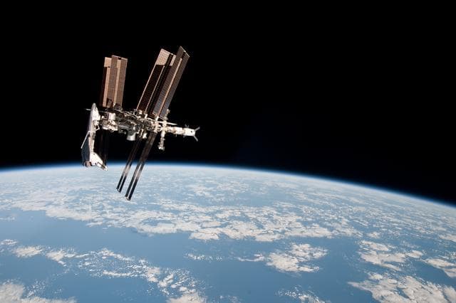 NASA image: Soyuz flyaround imagery of STS-134 Endeavour docked to the ISS