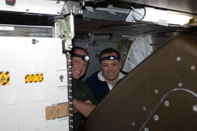 NASA image: View of STS-134 MS Fincke and Expedition 28 FE Garan posing for a photo during Joint Operations
