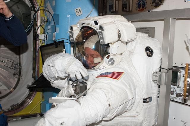 NASA image: STS-134 MS Fincke prepares for EVA-3