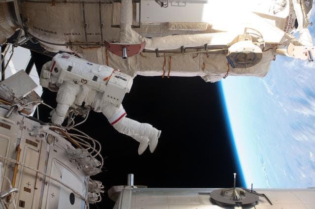 NASA image: View of STS-134 MS Feustel working during EVA-3
